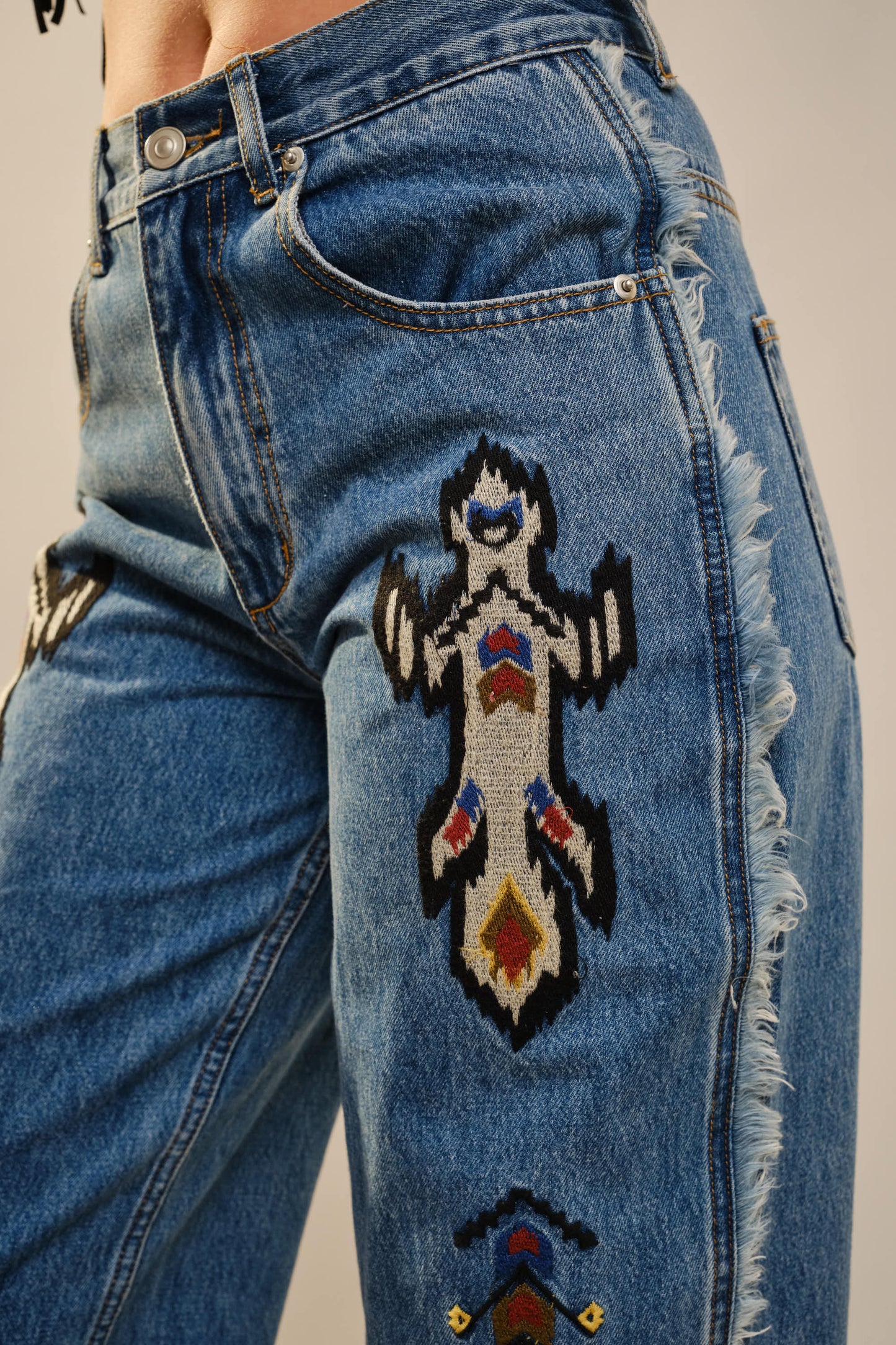 Embroidered Fringe Jeans